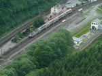 Ausfahrt einer BR 4000 Lok mit DoStoswagen aus dem Bahnhof von Kautenbach, als IR in Richtung Luxmburg.