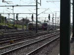 Steuerwagen 016 wird mit den Dostos von E-Lok 4010 aus dem Bahnhof von Ptange in Richtung Luxemburg geschoben.