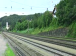 1016 045 mit einem leeren Autozug am 14.07.2012 bei der Durchfahrt in Wernstein am Inn.