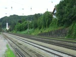 1016 013 mit einem gemischten Güterzug am 14.07.2012 bei der Durchfahrt in Wernstein am Inn.
