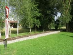 Ankunft des Stainzer Flascherlzugs in voller Länge im Bahnhof Stainz, 04.08.2019     Aufnahme vom Bahnübergang Langwiesenbachgasse.