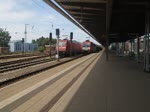 SETG 482 042-9 mit dem Holzzug von Rostock-Bramow nach Stendal-Niedergörne bei der Ausfahrt im Rostocker Hbf.28.07.2013