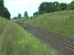 182 118 mit einem Schiebewandwagenzug am 21.07.2012 bei Kunowice.