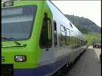 Berner Oberland 2004 (VHS-Archiv) - Mit einem NINA haben wir Faulensee am Thunersee erreicht. Dem Regionalzug nach Spiez folgt wenig spter der InterCity Interlaken Ost-Spiez-Bern-Romanshorn, gebildet aus IC 2000-Doppelstockwagen und der passenden Re 460 dazu.