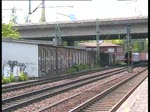 Eine Re 482 fuhr mit einem Containerzug durch den Bahnhof Hamburg-Harburg am 22.5.