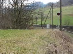Eine Ae 6/6 ist am 14.03.2009  mit einem niedlichem  Geti  bei Tecknau unterwegs.