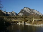 Hinterrheinbrcke bei Reichenau. Der RE 1240 hat gerade den Bahnhof Reichenau-Tamins verlassen und fhrt nun ber die Eisenbahnbrcke, wo sich Hinter- und Vorderrhein treffen, nach Disentis weiter. 27.11.2011