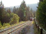 Glacier Express mit Ge 4/4 III, von Thusis her kommend, kurz vor Tiefencastel, 22. Sept. 2003