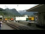 Graubnden 2010 - Die wohl lteste Rangierlok der RhB, die Ge 2/2 161 aus dem Jahr 1911 ist am 14.06.2010 in Poschiavo zu Gange. Kurze Zeit spter trifft am Gleis 3 der Regionalzug nach St. Moritz ein, welcher die Kreuzung mit dem Gegenzug abwarten muss. Diesem sind die beiden ABeh 4/4 48 und 46 vorgespannt. Noch ein letztes Mal erleben wir diese beiden Fahrzeuge in Aktion, denn bereits 6 Monate spter wurden sie auer Dienst gestellt.