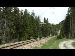Rhätische Bahn 2008 - Zwischen Cinuos-chel Brail und Zernez begegnet uns am Nachmittag des 08.06.2008 die Ge 4/4 615  Klosters  mit R 1933  Scuol Tarasp - Pontresina.
