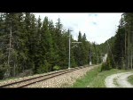 Rhtische Bahn 2008 - Zwischen Cinuos-chel Brail und Zernez begegnet uns am Nachmittag des 08.06.2008 die Ge 4/4 615  Klosters  mit R 1933  Scuol Tarasp - Pontresina.