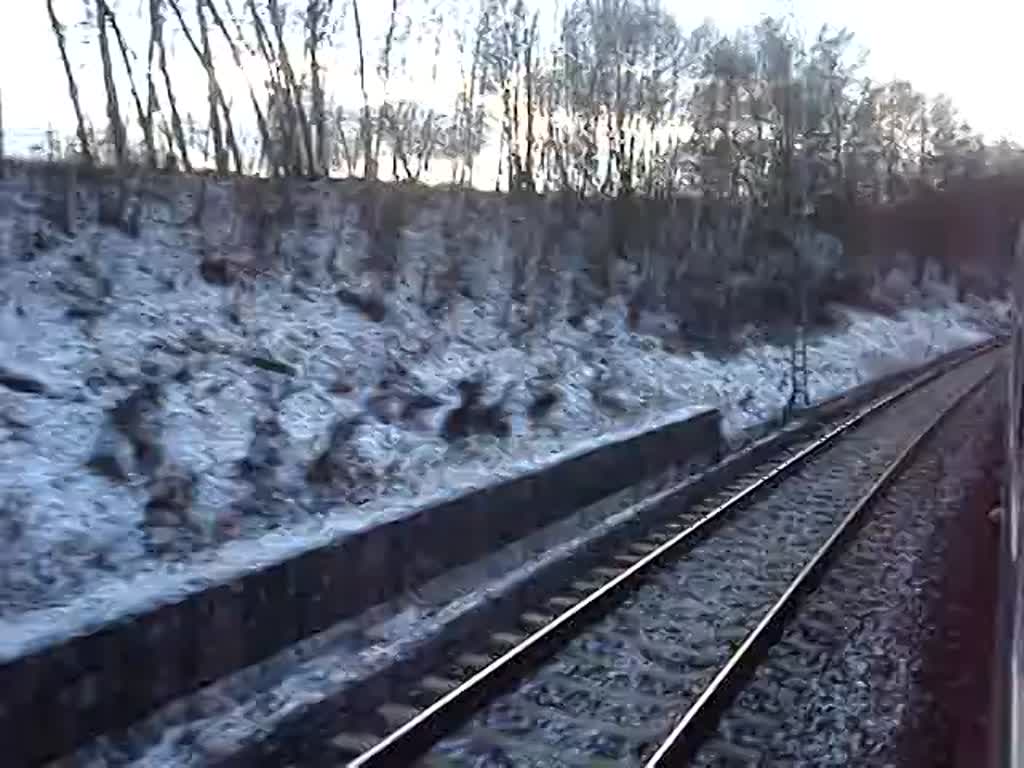 Zugbegegnung auf der Strecke Plzen-Cheb. Der entgegenkommende Regionalzug ist auf dem Weg Richtung Plzen hl.n. Januar 2013